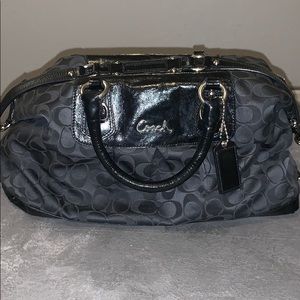 Coach black purse with patent leather detail
